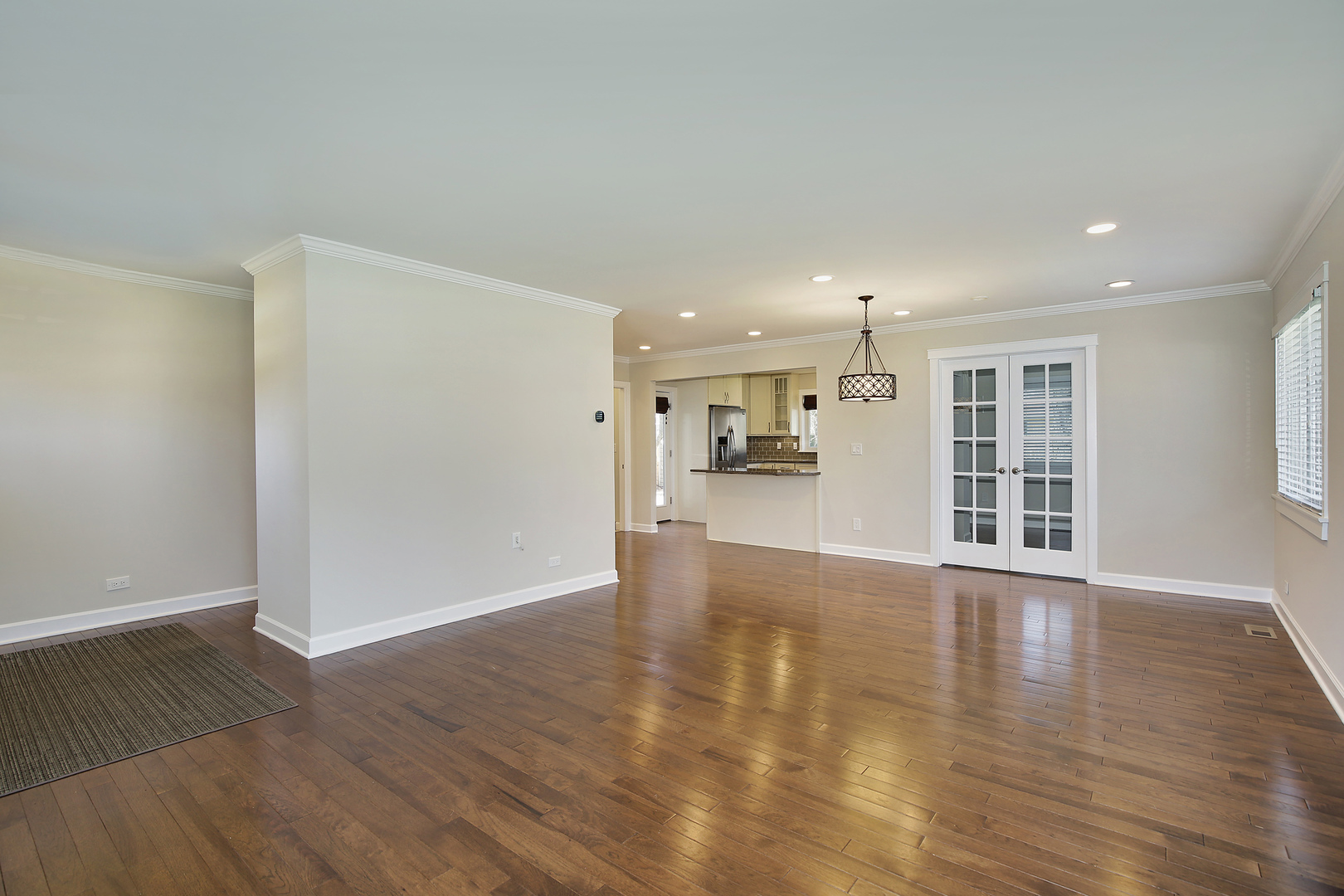 1342 Kenton Road Deerfield, IL 60015 - Photo 2 of 12 a view of a livingroom with wooden floor