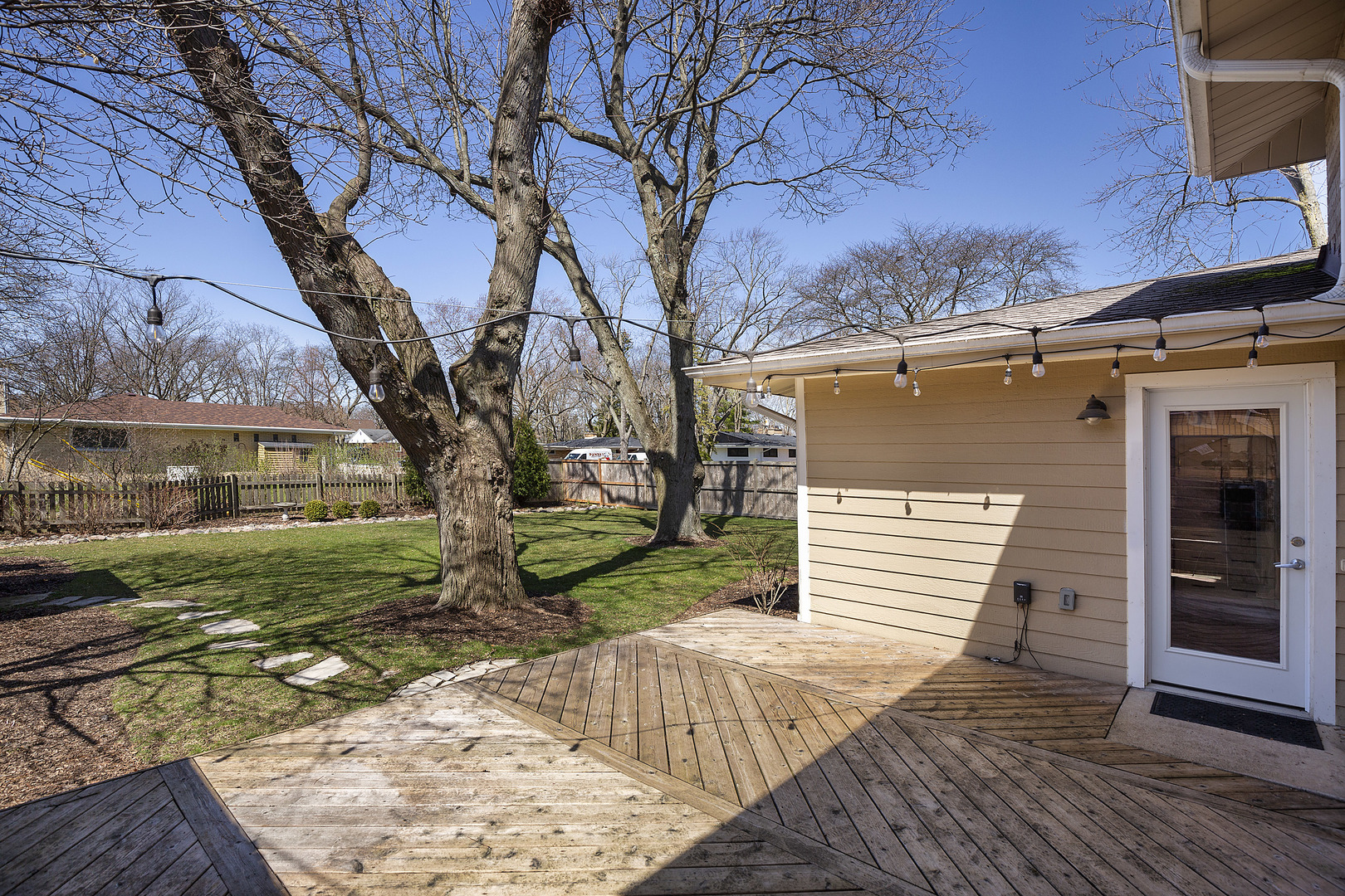 1342 Kenton Road Deerfield, IL 60015 - Photo 10 of 12 a front view of a house with a yard