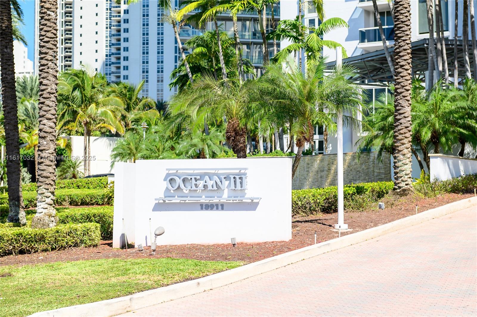 18911 Collins Avenue, Unit 1003 Sunny Isles Beach, FL 33160 - Photo 26 of 47 a sign that is on the side of a road