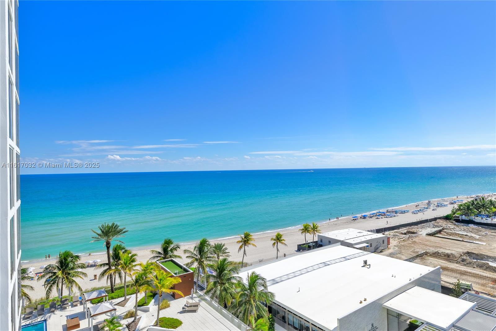 18911 Collins Avenue, Unit 1003 Sunny Isles Beach, FL 33160 - Photo 39 of 47 a view of a terrace with a table and chairs