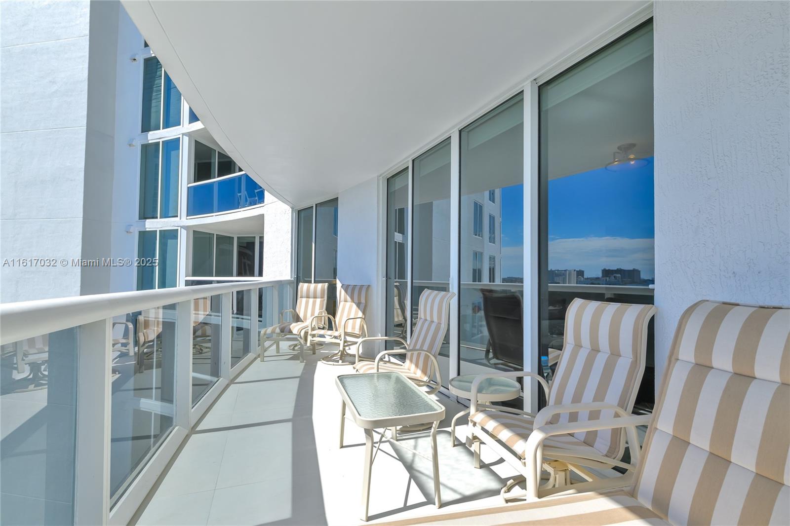 18911 Collins Avenue, Unit 1003 Sunny Isles Beach, FL 33160 - Photo 45 of 47 a view of balcony with furniture