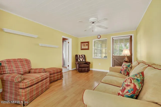 a kitchen with stainless steel appliances granite countertop a sink and a microwave