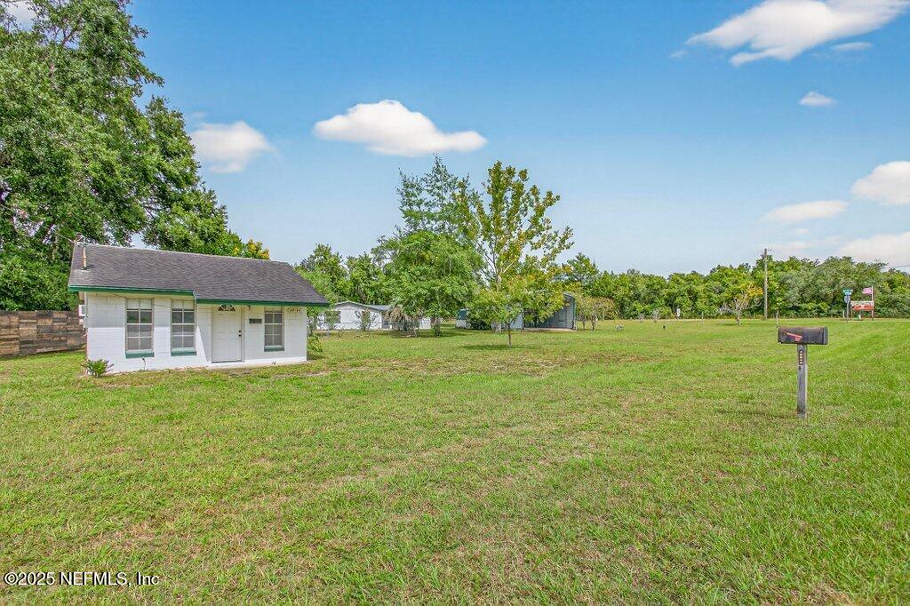 24480 Northeast 127 Street Salt Springs, FL 32134 - Photo 39 of 59 a view of a house with a backyard