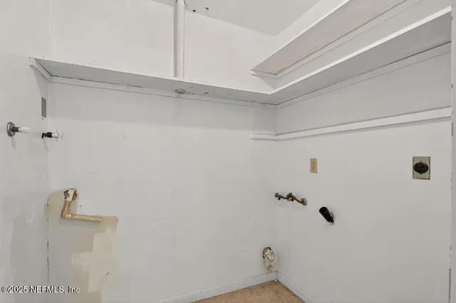 a swimming pool with outdoor space and seating area