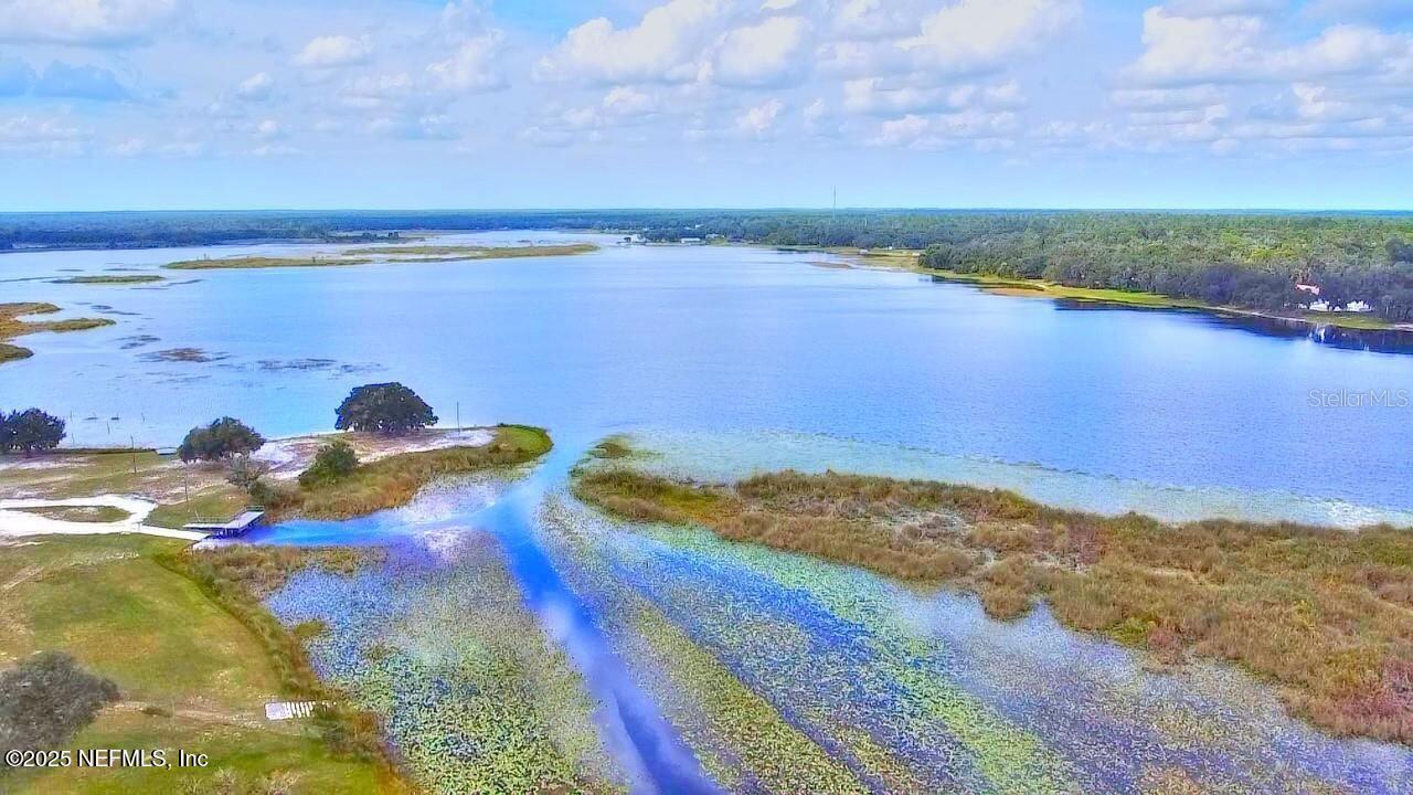 24480 Northeast 127 Street Salt Springs, FL 32134 - Photo 52 of 59 a view of an ocean and beach
