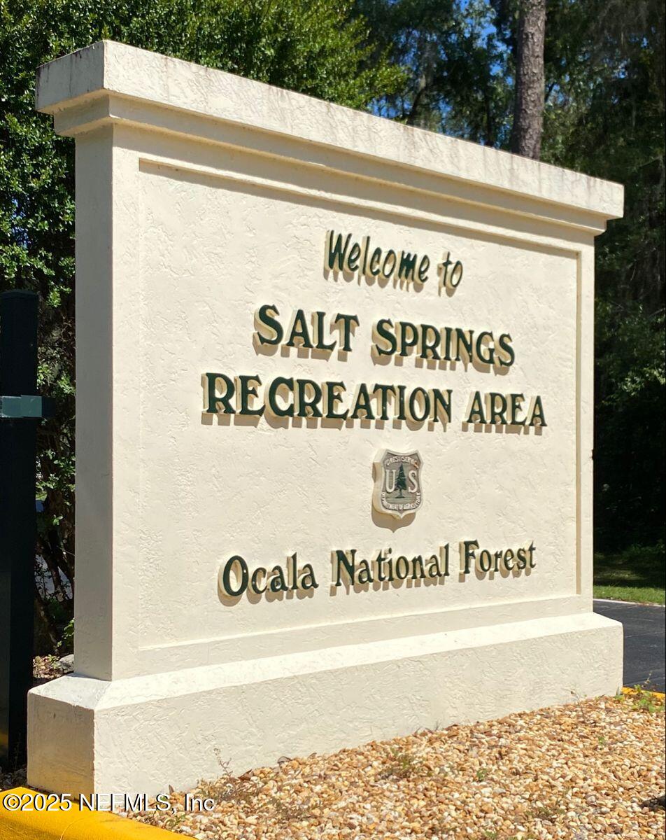 24480 Northeast 127 Street Salt Springs, FL 32134 - Photo 54 of 59 a sign on the side of a building