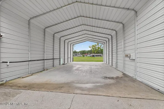 a front view of a house with a garage