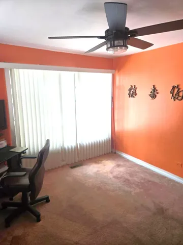 a view of a room with a window