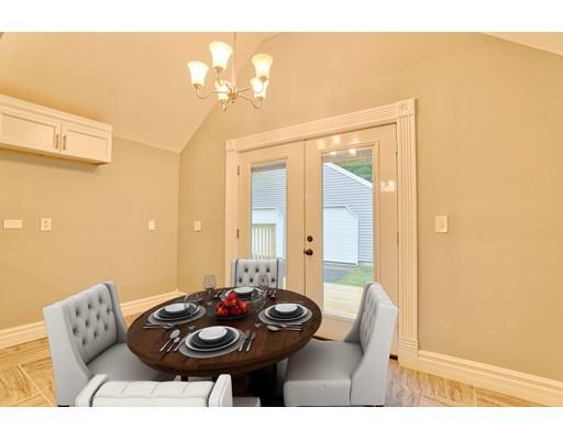 54 Ames Road Hampden, MA 01036 - Photo 8 of 16 a view of a dining room with furniture and wooden floor