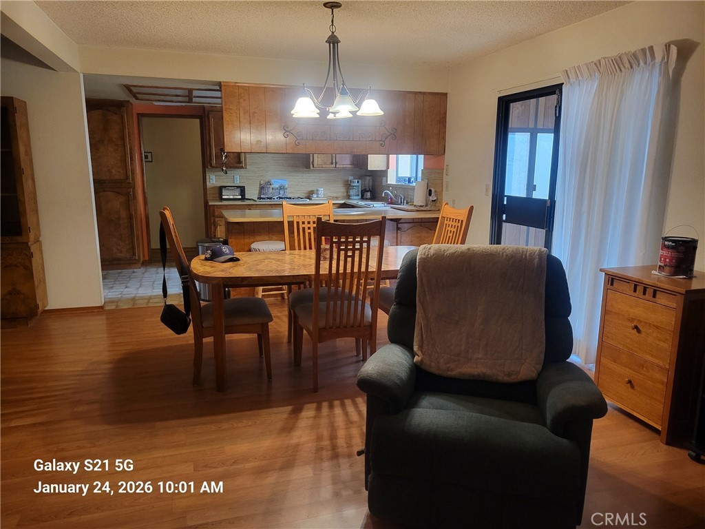 41367 Shadow Palm Way Hemet, CA 92544 - Photo 5 of 35 a dining room with furniture and window