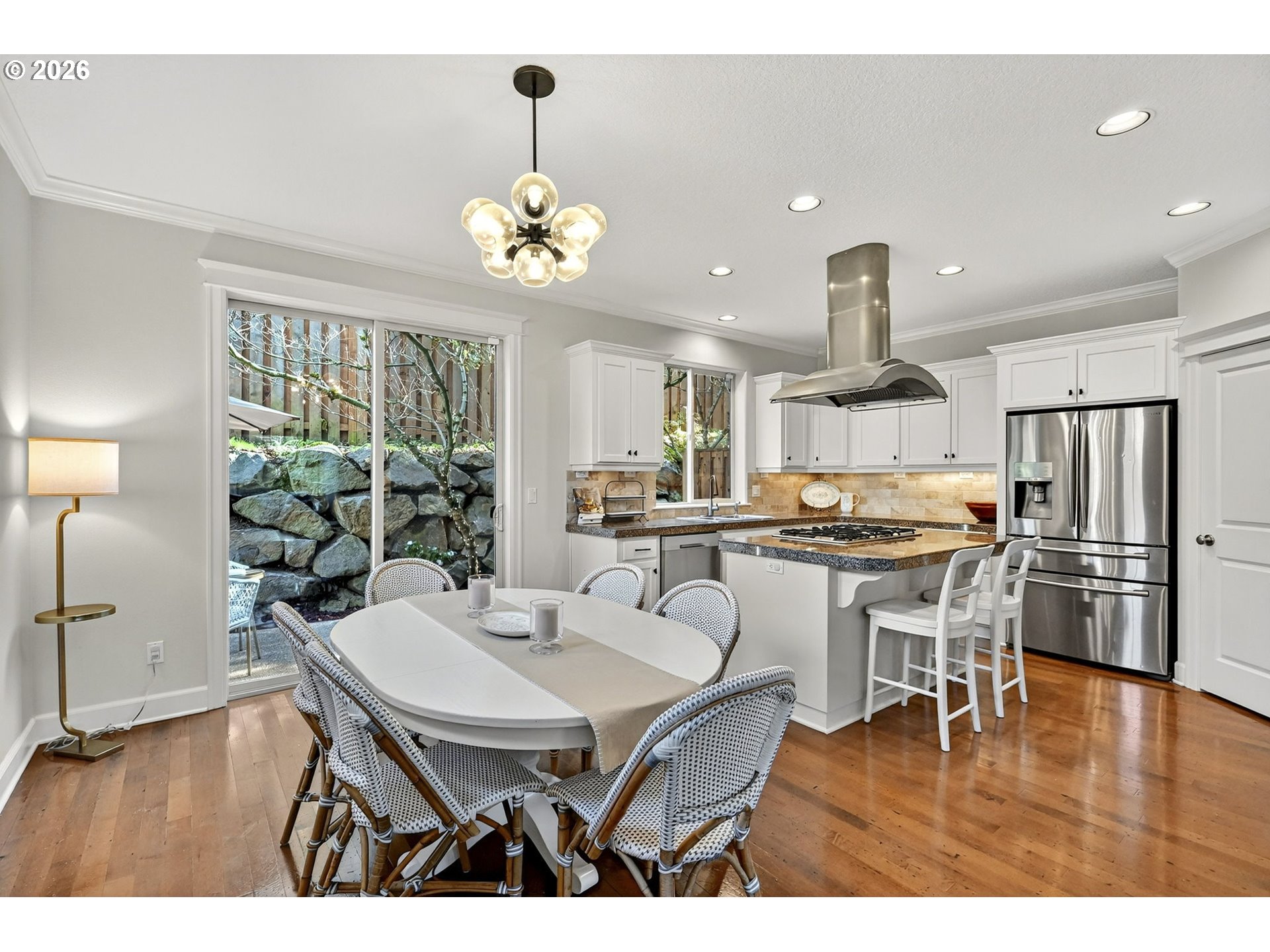 2064 Northwest Village Circle, Unit 44 Portland, OR 97229 - Photo 12 of 45 a view of a dining room with furniture window and wooden floor