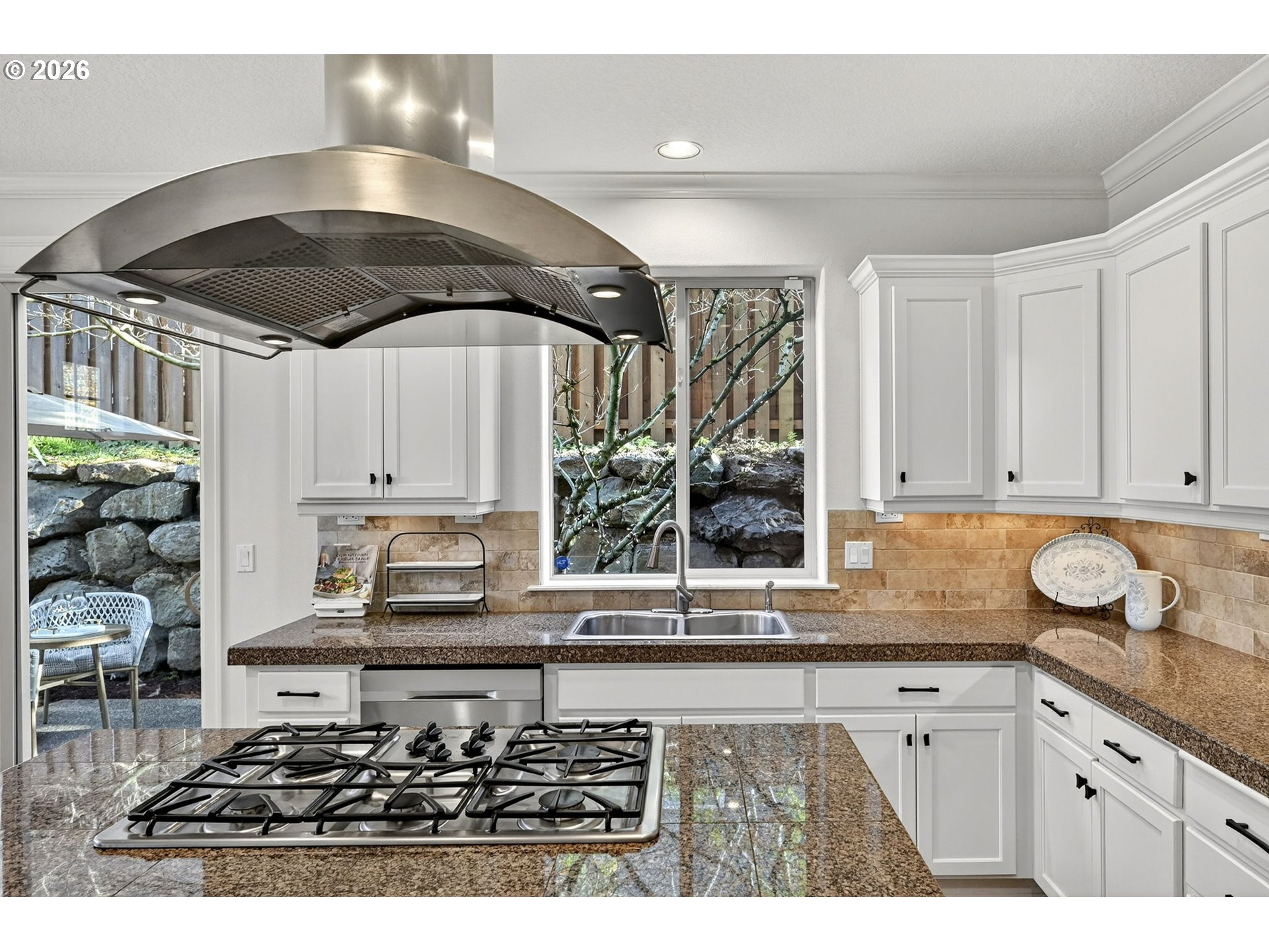 2064 Northwest Village Circle, Unit 44 Portland, OR 97229 - Photo 15 of 45 a kitchen with stainless steel appliances granite countertop a sink stove and cabinets