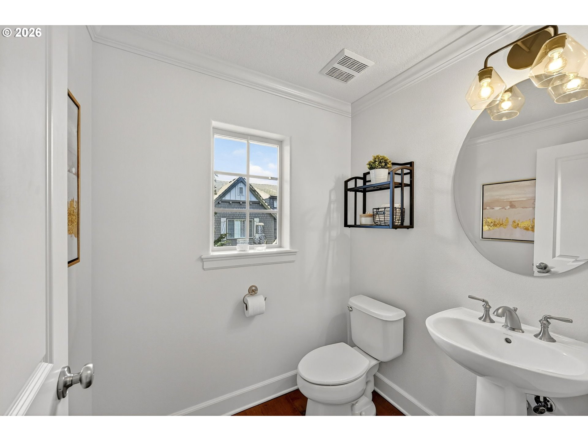 2064 Northwest Village Circle, Unit 44 Portland, OR 97229 - Photo 16 of 45 a bathroom with a toilet a sink and mirror