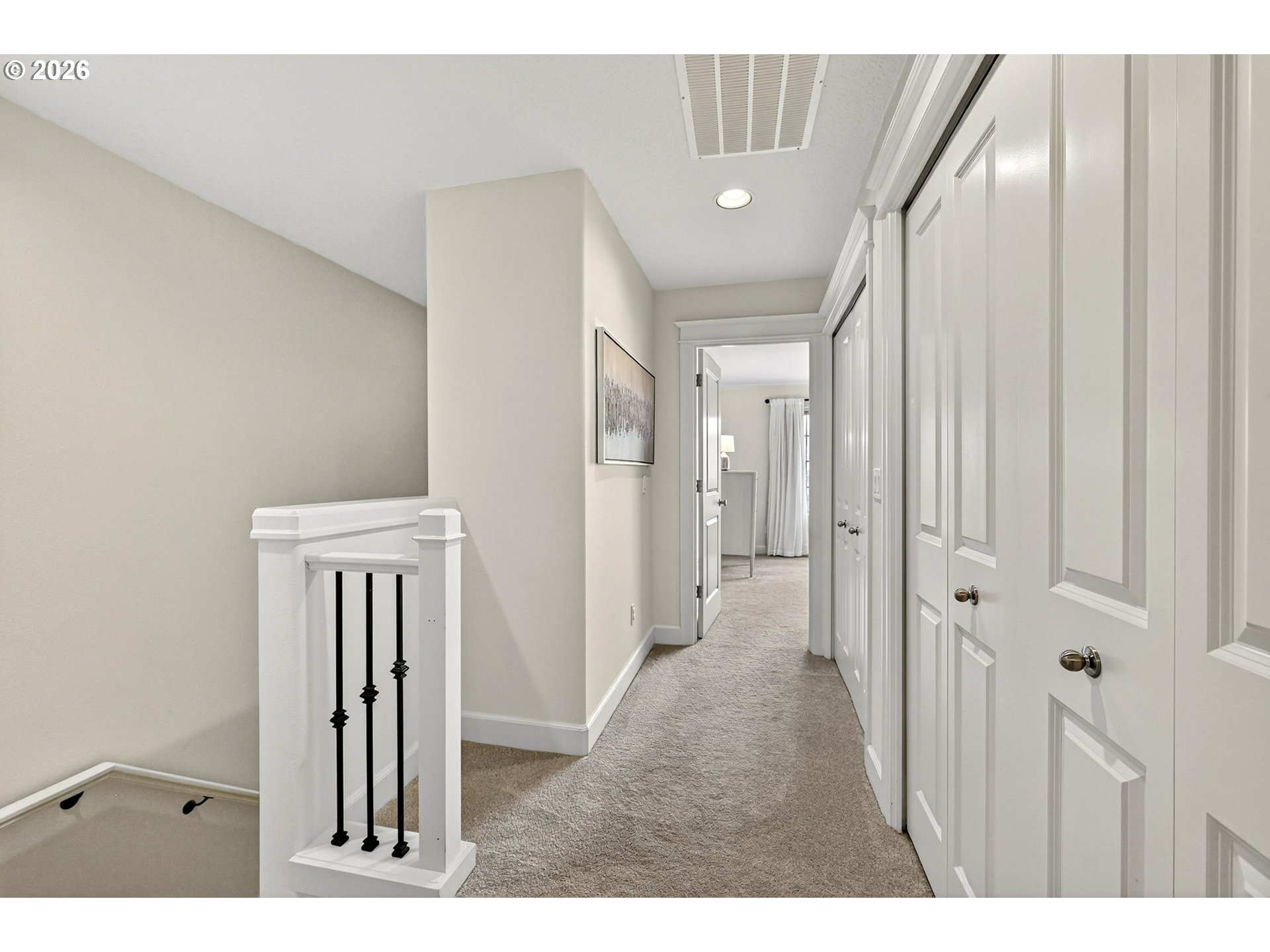 2064 Northwest Village Circle, Unit 44 Portland, OR 97229 - Photo 17 of 45 a view of a hallway with wooden floor and entryway