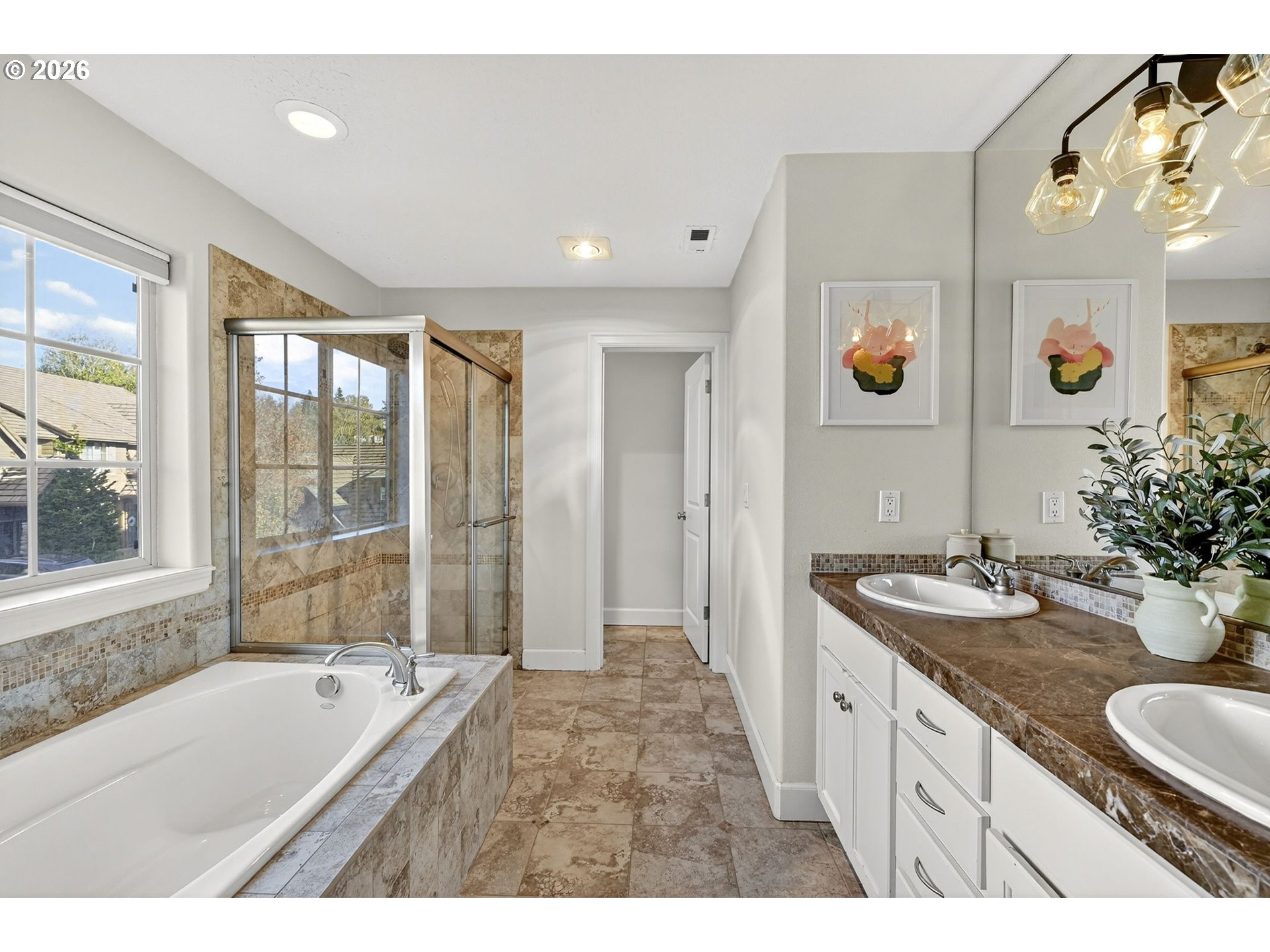 2064 Northwest Village Circle, Unit 44 Portland, OR 97229 - Photo 20 of 45 a bathroom with a granite countertop sink mirror and tub