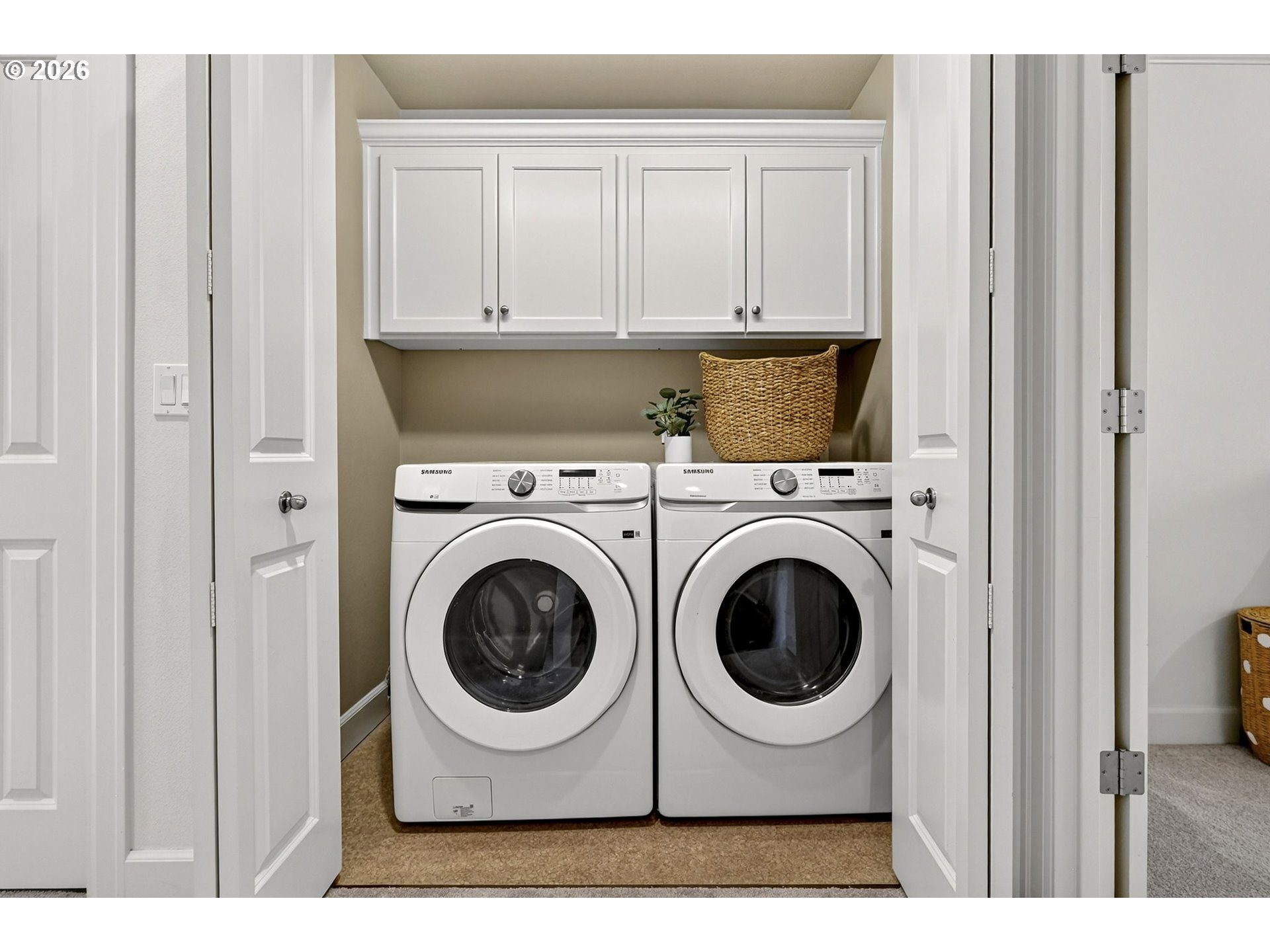 2064 Northwest Village Circle, Unit 44 Portland, OR 97229 - Photo 28 of 45 a utility room with dryer and washer