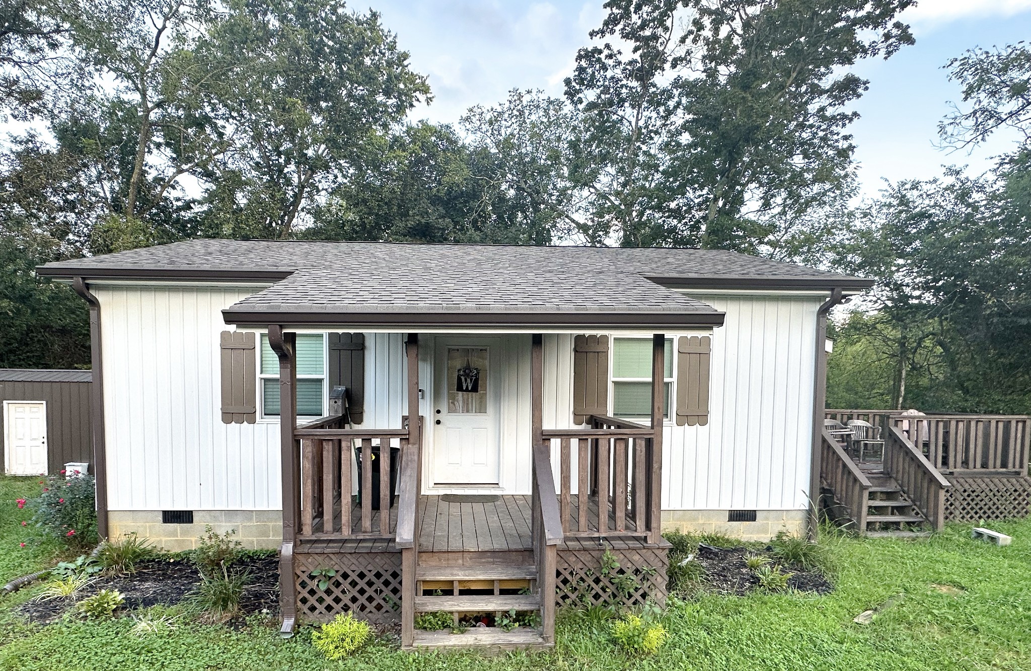 3820 Jefferson Road Smithville, TN 37166 - Photo 2 of 15 front view of house with a yard