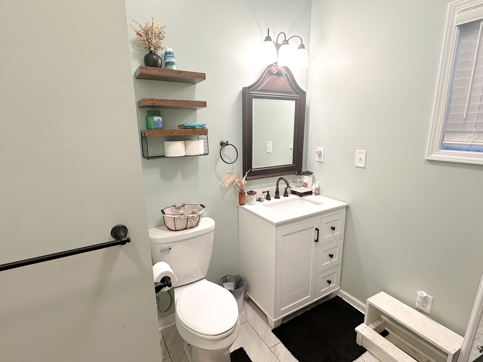 3820 Jefferson Road Smithville, TN 37166 - Photo 5 of 15 a bathroom with a sink mirror toilet and vanity