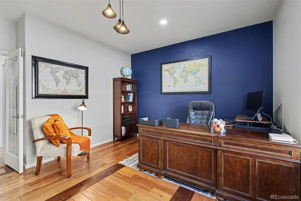 a view of a workspace with furniture