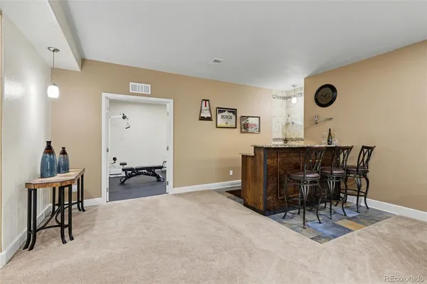 a workspace with furniture and window