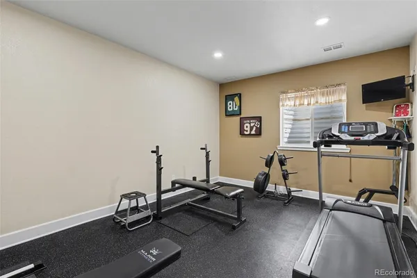 a view of a room with gym equipment