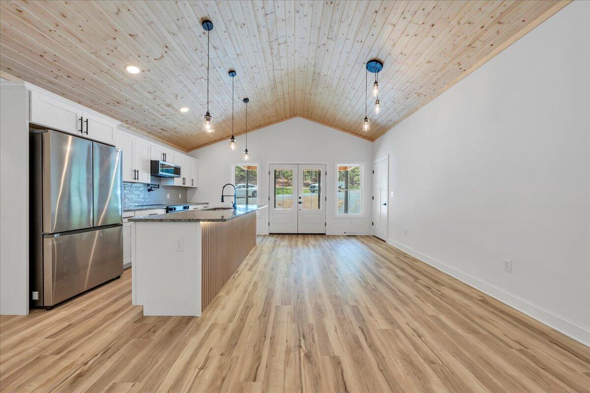2365 Lakewood Forest Road Moneta, VA 24121 - Photo 11 of 90 a view of kitchen with furniture and wooden floor