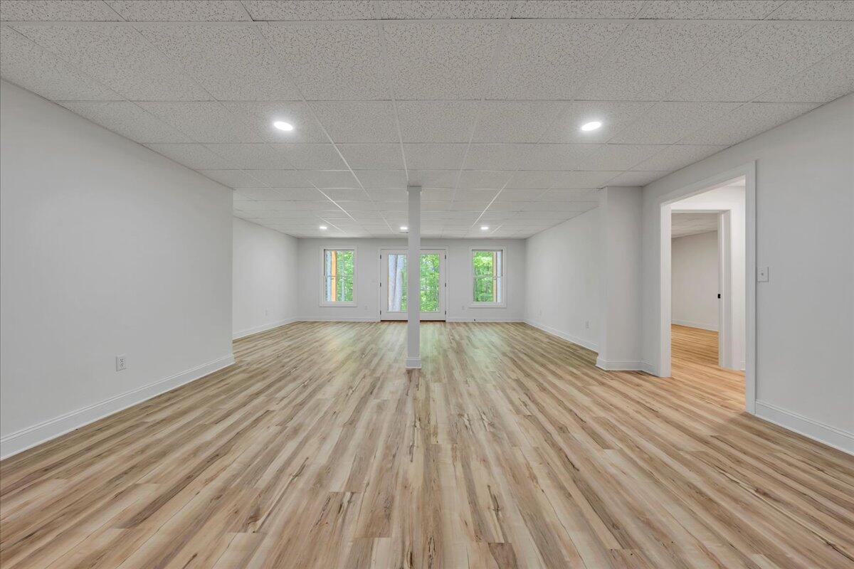 2365 Lakewood Forest Road Moneta, VA 24121 - Photo 33 of 90 wooden floor in an empty room with a window
