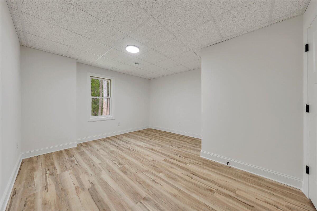 2365 Lakewood Forest Road Moneta, VA 24121 - Photo 38 of 90 a view of empty room with wooden floor and fan