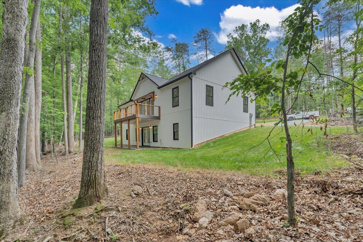 2365 Lakewood Forest Road Moneta, VA 24121 - Photo 48 of 90 a view of a house with backyard and garden