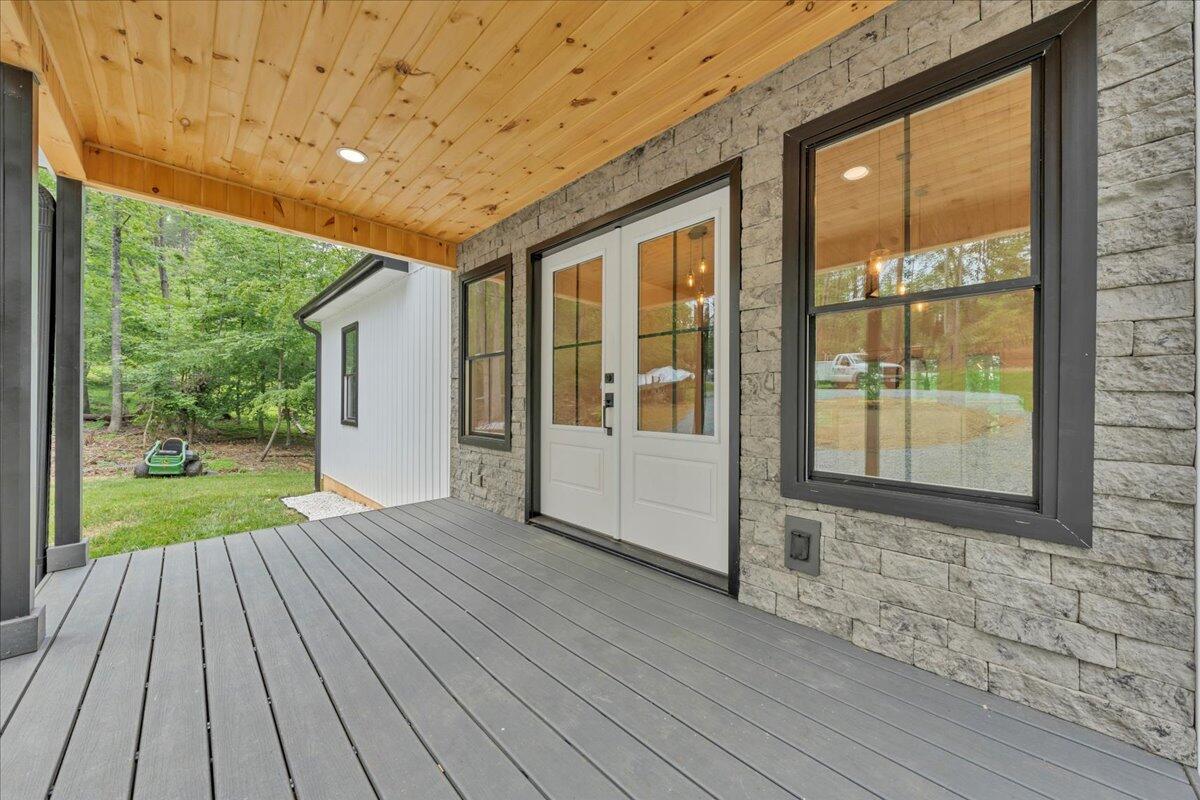 2365 Lakewood Forest Road Moneta, VA 24121 - Photo 5 of 90 a view of porch with wooden floor and outdoor space
