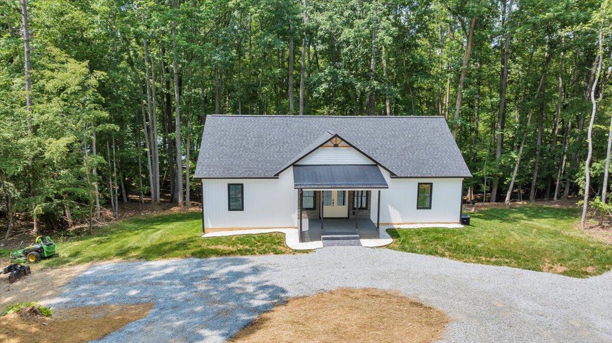 2365 Lakewood Forest Road Moneta, VA 24121 - Photo 54 of 90 front view of a house with a yard