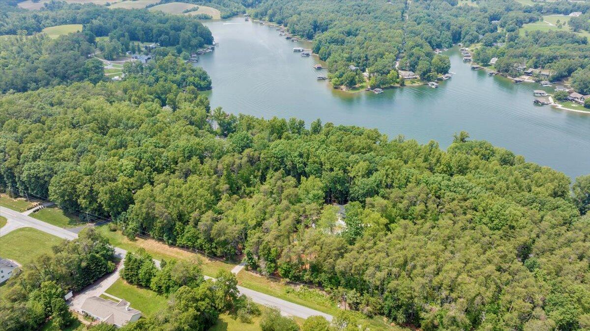 2365 Lakewood Forest Road Moneta, VA 24121 - Photo 60 of 90 an aerial view of a house with a yard and lake view