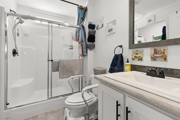 a bathroom with a sink and toilet