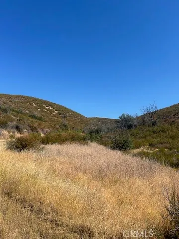 a view of mountain with lake view