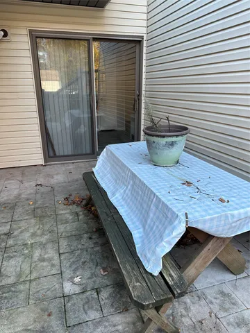 a view of a backyard with a wooden door