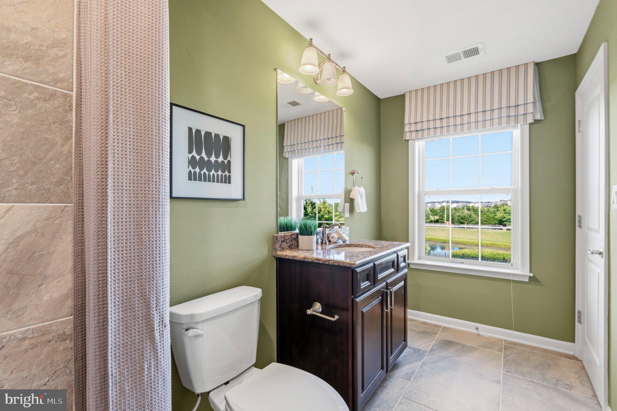731 Holden Road Frederick, MD 21701 - Photo 57 of 78 Serene bathroom with nature views.