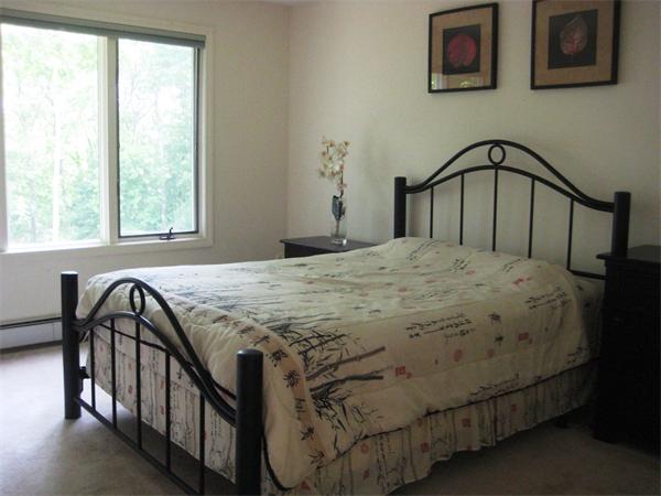 17 Aspen Road Sharon, MA 02067 - Photo 8 of 21 a bedroom with a bed and a window