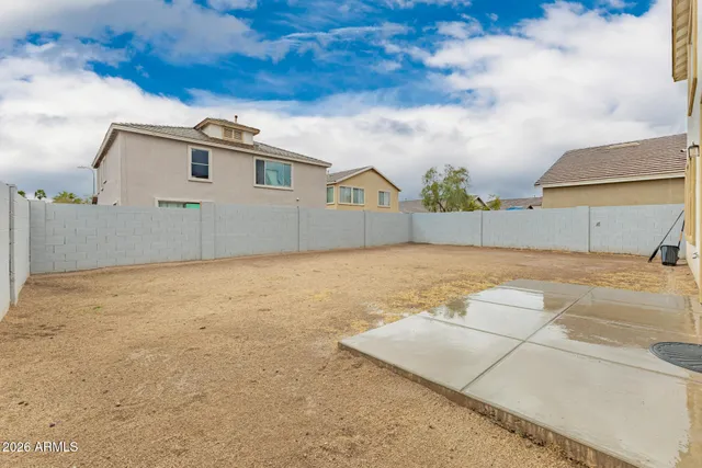 a view of a house with basketball court