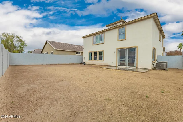 a house with a barbeque