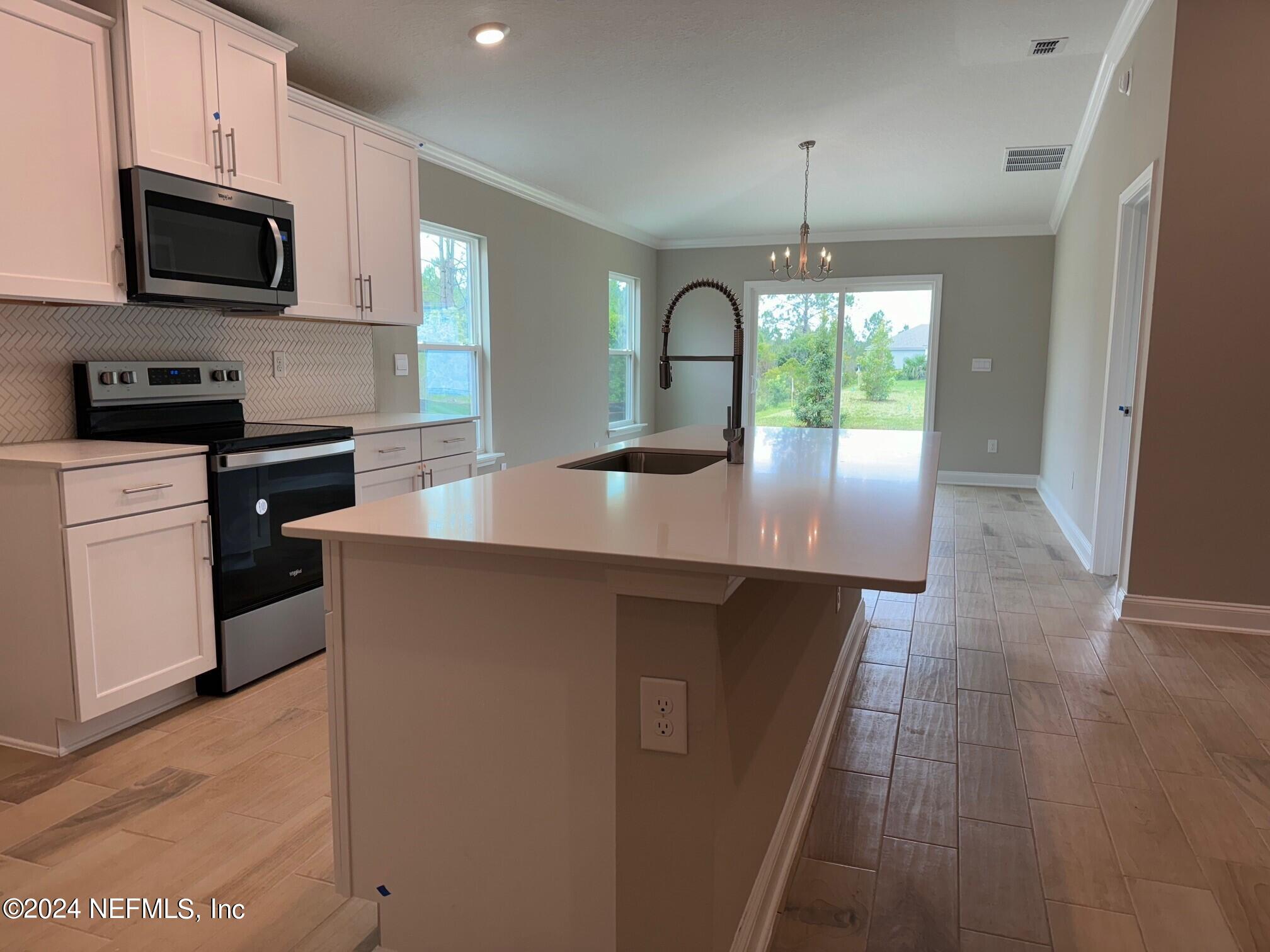 62 Hulett Wds Road Palm Coast, FL 32137 - Photo 4 of 22 3
