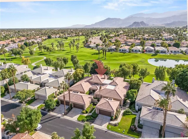 a view of a city with a lake