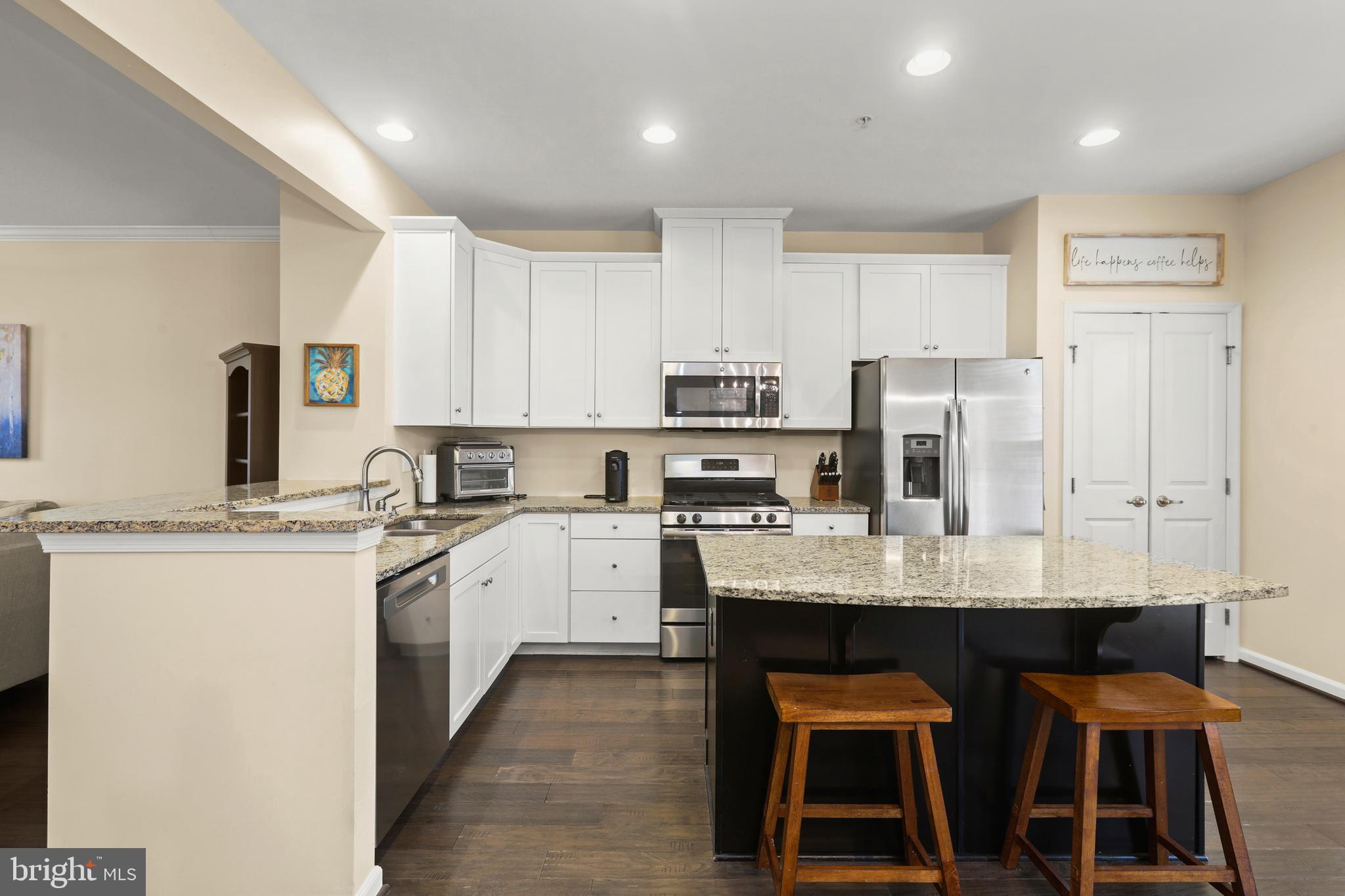 605 Buggy Ride Road Bel Air, MD 21015 - Photo 19 of 55 Island with espresso cabinets and granite overhang