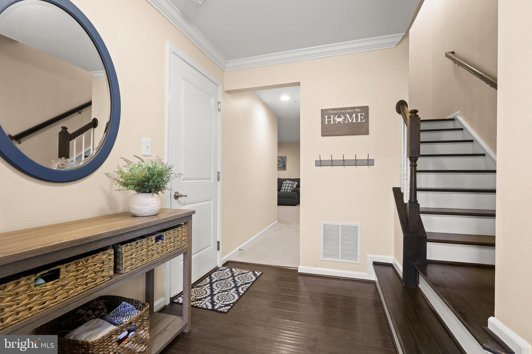 605 Buggy Ride Road Bel Air, MD 21015 - Photo 6 of 55 Foyer w/ hardwood floors oak stairs, garage access