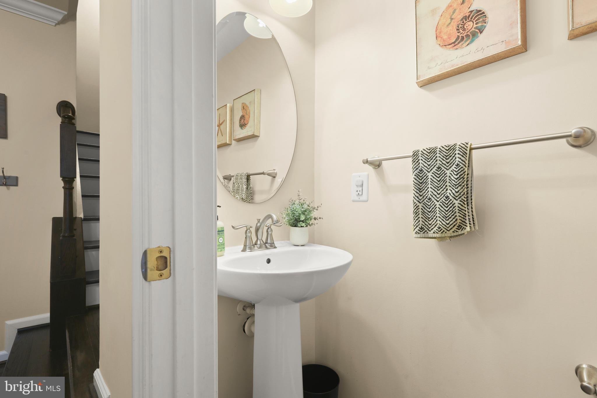 605 Buggy Ride Road Bel Air, MD 21015 - Photo 8 of 55 Powder Room with hardwood floors and pedestal sink