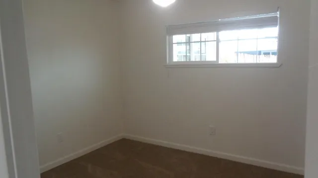 an empty room with a window