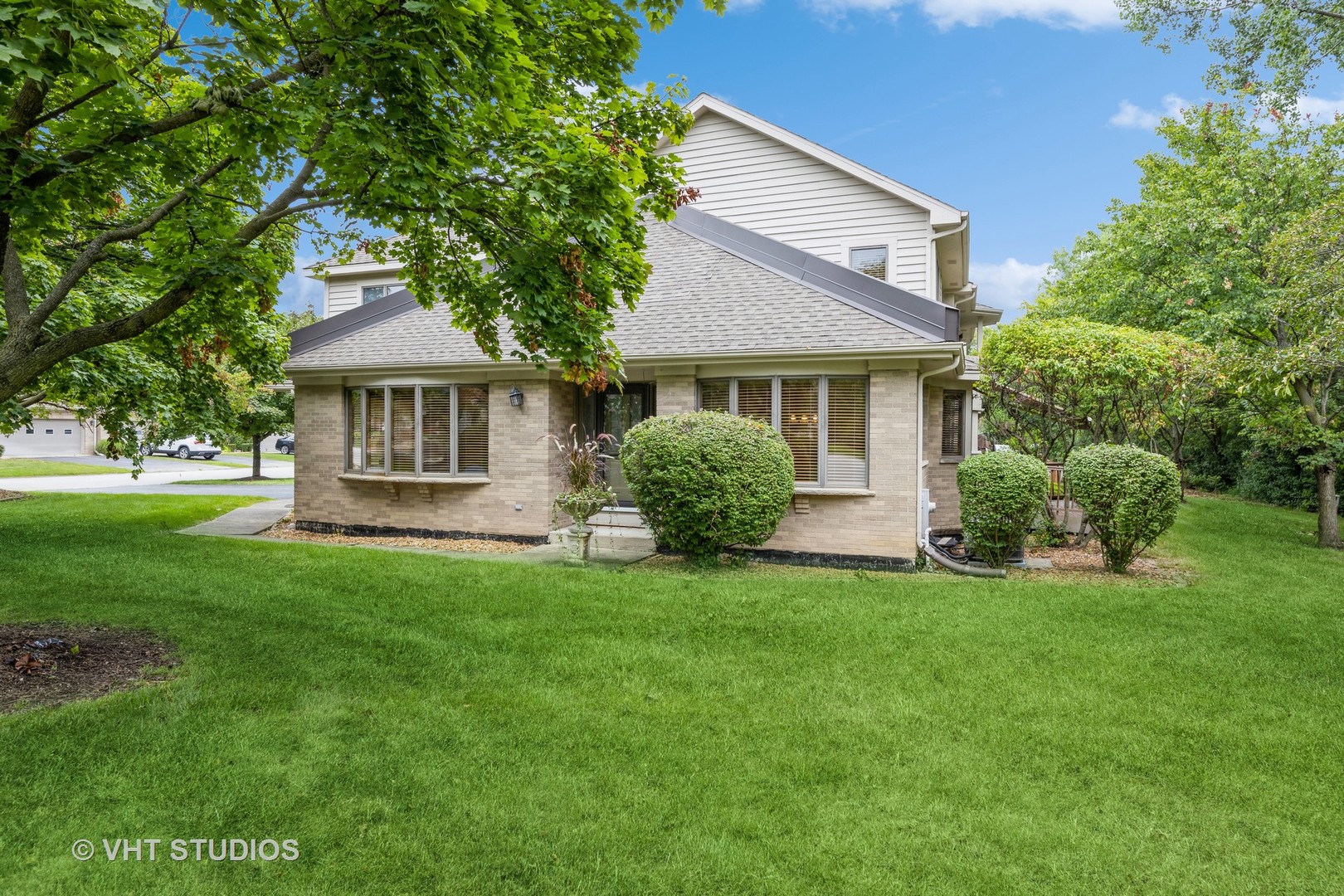 229 Shea Drive Flossmoor, IL 60422 - Photo 2 of 25 a front view of a house with a yard