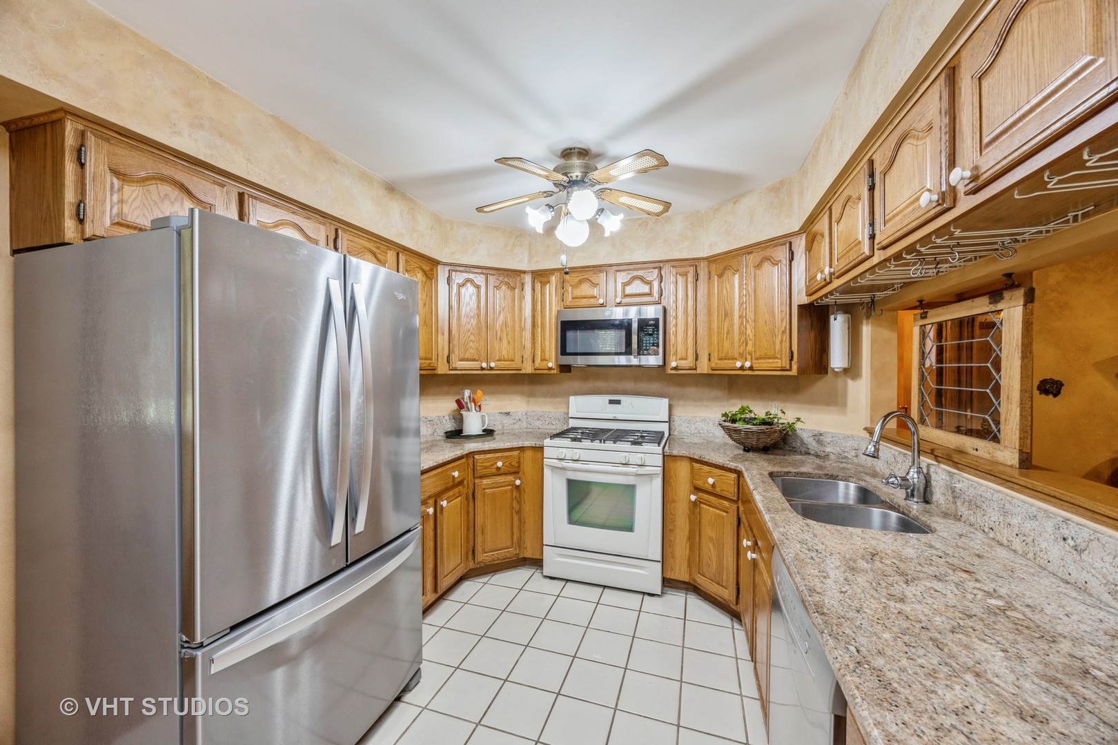 229 Shea Drive Flossmoor, IL 60422 - Photo 3 of 25 a large kitchen with stainless steel appliances granite countertop a stove top oven a refrigerator a sink and dishwasher