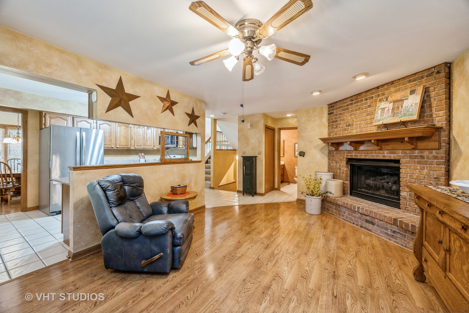 229 Shea Drive Flossmoor, IL 60422 - Photo 7 of 25 a living room with furniture and a fireplace