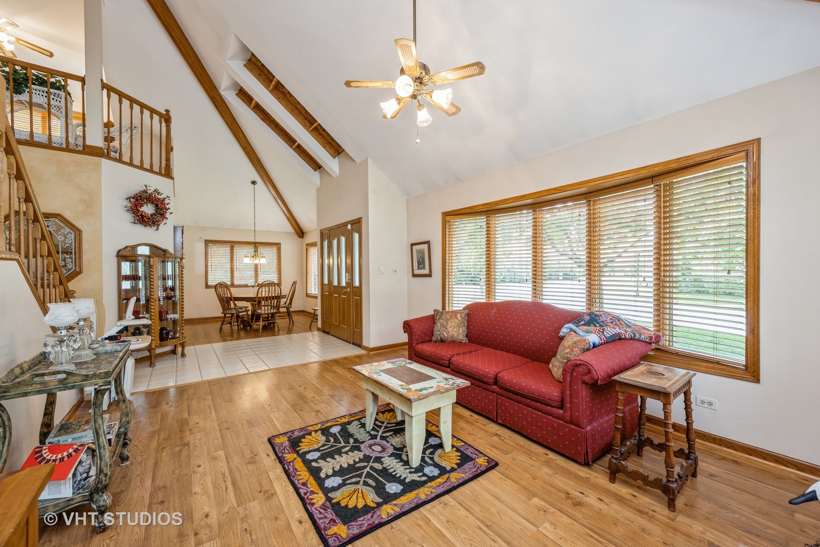 229 Shea Drive Flossmoor, IL 60422 - Photo 8 of 25 a living room with furniture fireplace and a large window