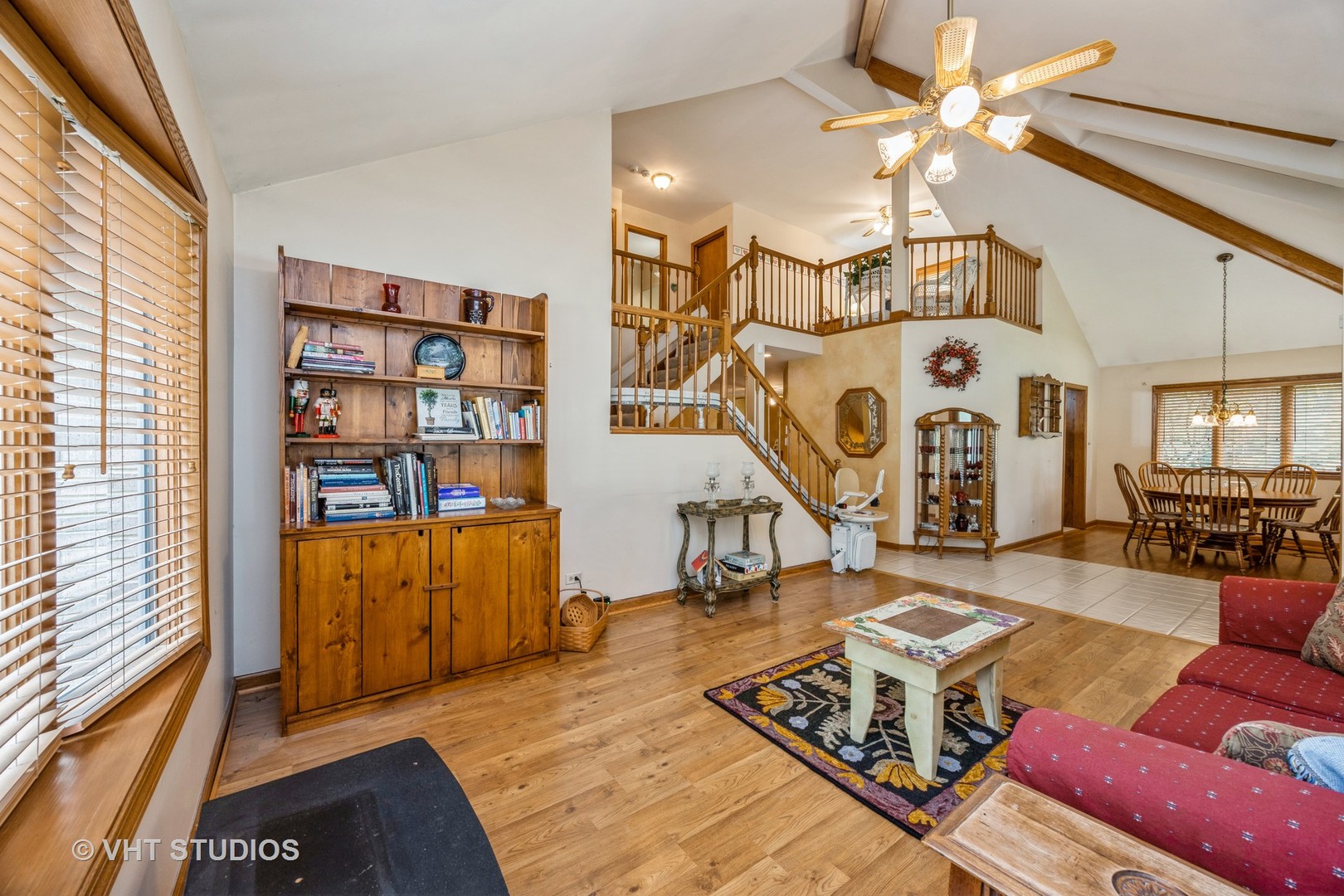 229 Shea Drive Flossmoor, IL 60422 - Photo 10 of 25 a living room with furniture a rug and a window